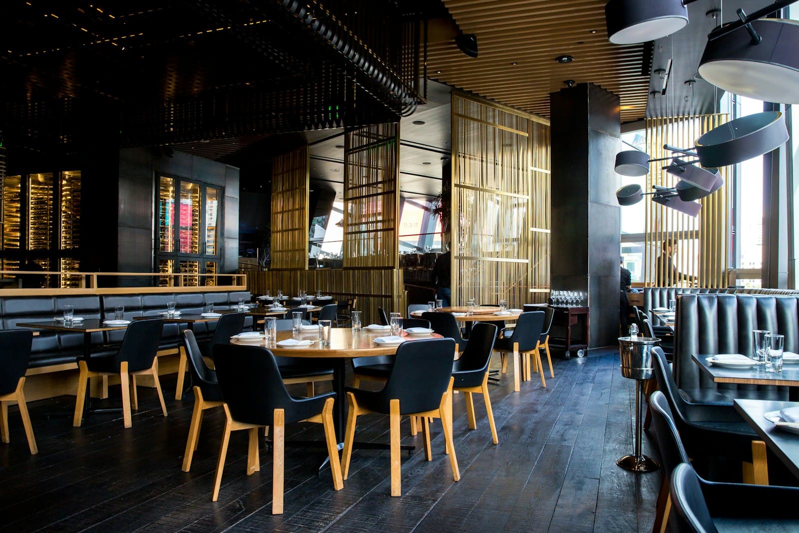 Restaurant interior with tables and warm lighting - agent-ready dining